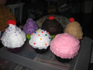 December 2012 - Felt Pincushion cup-cakes. Saw this online, had to try. Used silicone cupcake cups from the Dollar store, and hand-stitched on the felt and other decorations.